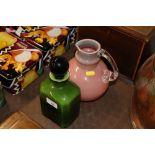 A Murano type green glass scent bottle and a pink glass baluster vase
