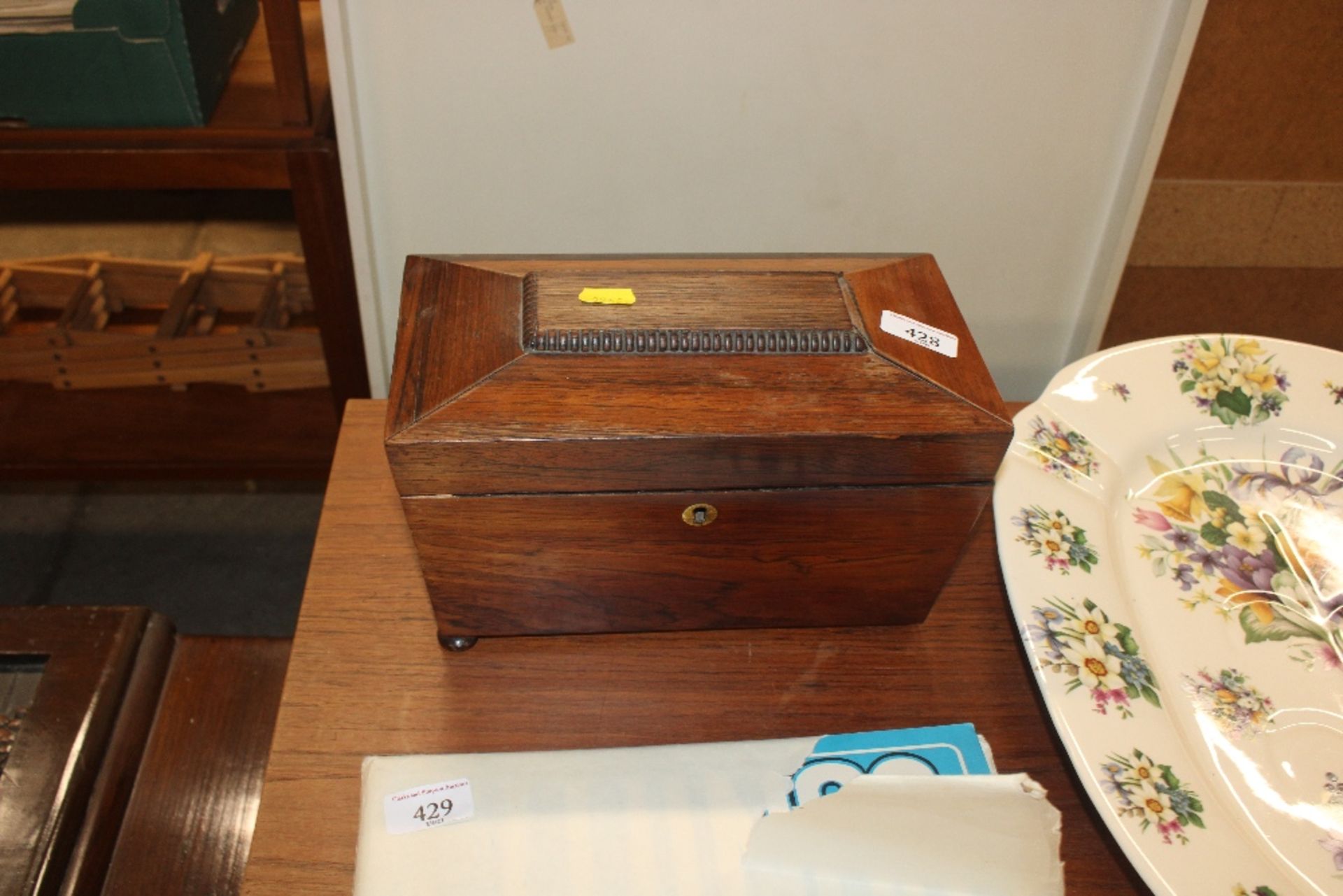 A Victorian rosewood sarcophagus shaped tea caddy