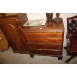 A Georgian mahogany chest fitted brushing slide an
