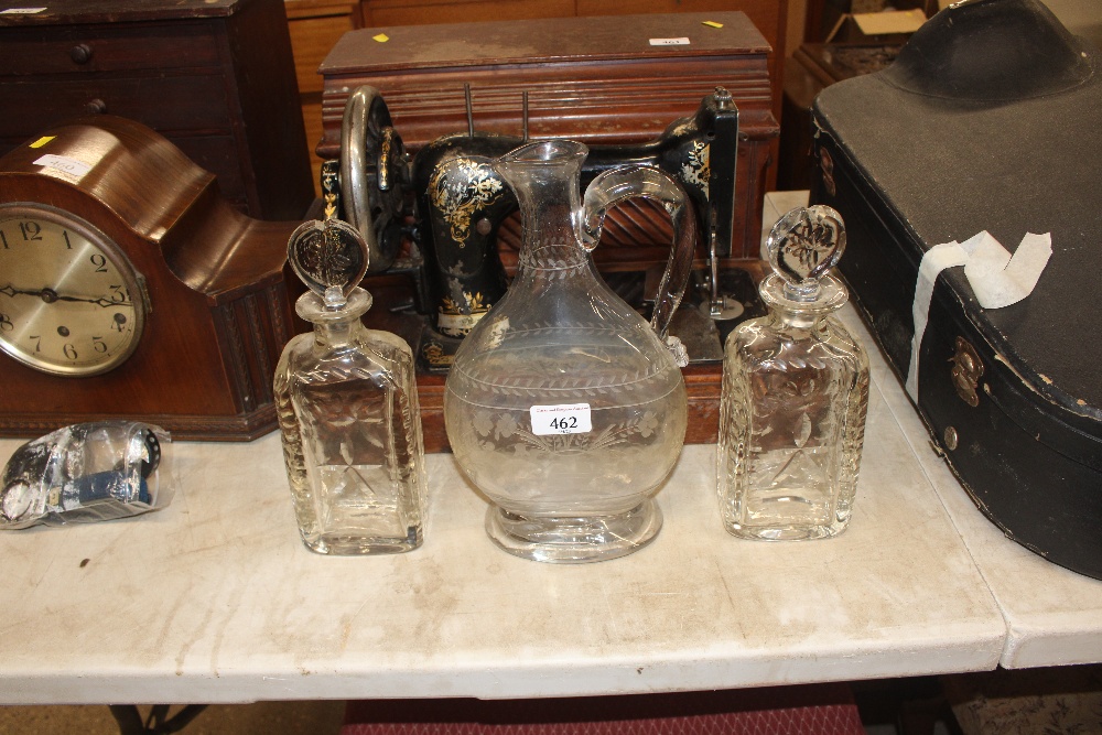 An antique cut glass water jug and a pair of 19th