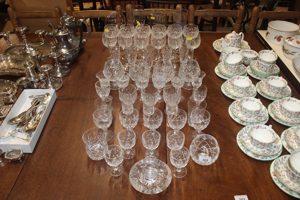 A collection of various cut and other table glassw