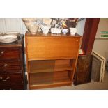 A teak circa 1970's writing cabinet with bookshelv