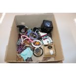 A box of assorted wrist watches and costume jewell