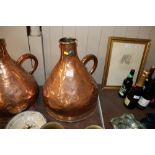 A large antique copper jug of haystack shape