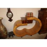 A faux rosewood and birds eye maple Art Deco style