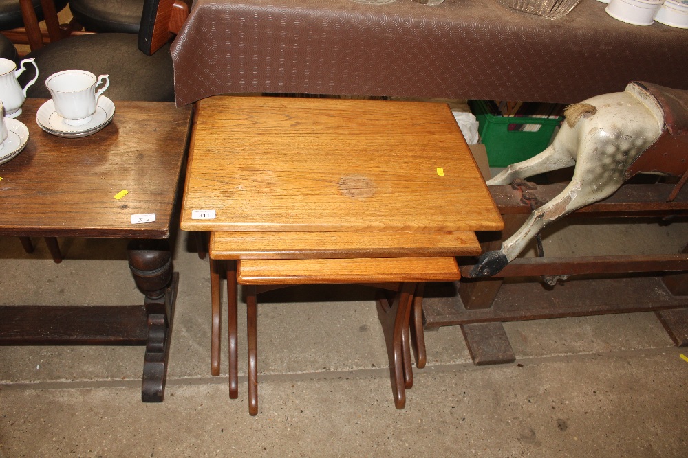 A nest of teak G-plan design occasional tables