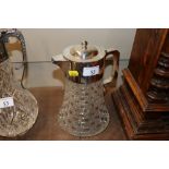 A hob nail cut and electroplate mounted claret jug