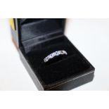 A 9ct white gold and tanzanite set ring, ring size
