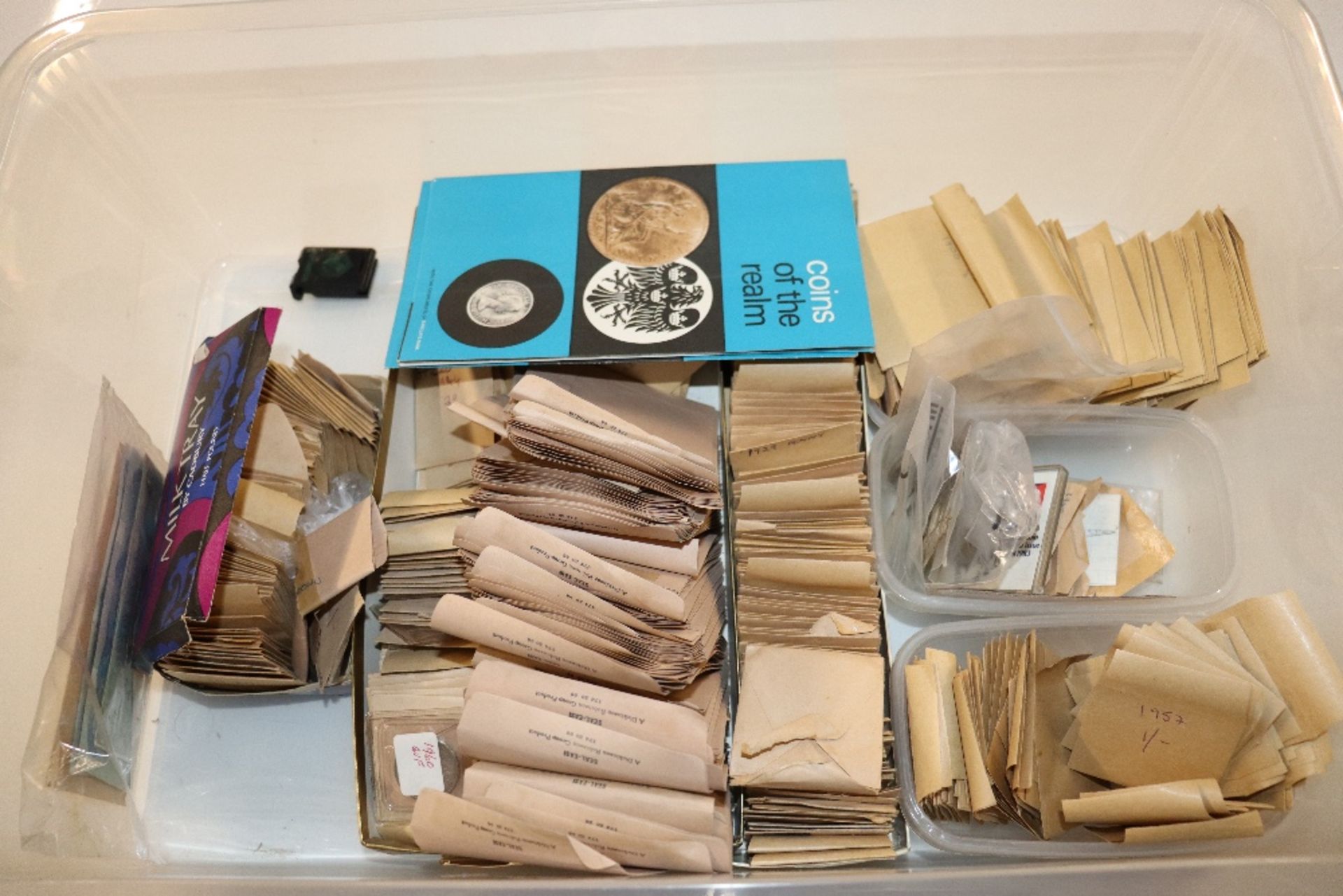 A box containing coin collection, some silver, cro