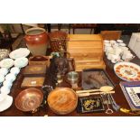 A collection of various wooden items, brass coffee