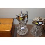 A cut glass and electroplate mounted claret jug