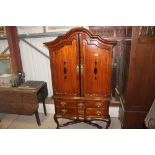 A Dutch mahogany and ebony inlaid side cabinet wit