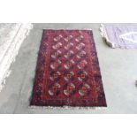 An approx. 4'7" x 2'10" Balochi rug