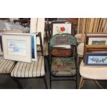 Three painted and decorated folding chairs