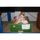 A box of various Barbie dolls etc