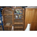 A wicker dome topped open fronted shelving unit