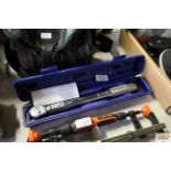 A 3/8" torque wrench in plastic case (67)