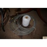 A roll of approx. 40m of steel cable and a large r