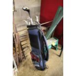 A golf bag and contents of clubs to include driver