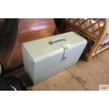 A green painted metal tool chest with internal dra