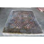 An approx. 7'8" x 6' Eastern pattern rug
