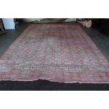 An approx. 14' x 9'11" Eastern pattern carpet
