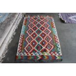 An approx. 5'3" x 3'2" Chobi Kelim rug