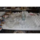 A large collection of table glassware