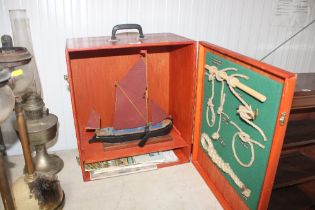 A model barge containing wooden case, door decorat