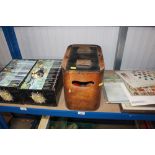 A bentwood box with contents of shoe cleaning kit