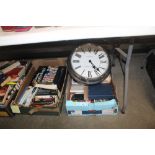 A box containing a Laura Ashley wall clock; place