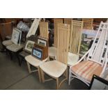 A set of six modern beech dining chairs