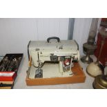 A Brother electric sewing machine in fitted carry