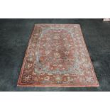 An approx. 4' x 6' Mandalay Collection wool rug
