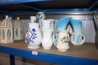 A quantity of decorative vases