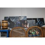Three canvas prints of Batman; Wonder Woman and Terminator