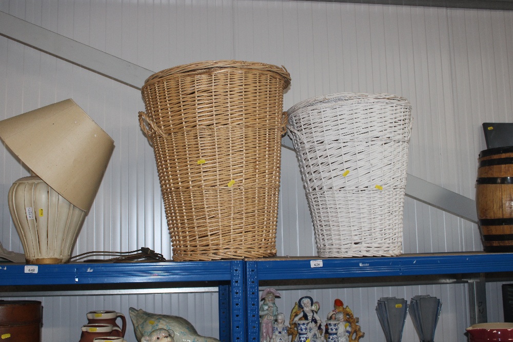 Two wicker laundry bins