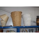 Two wicker laundry bins