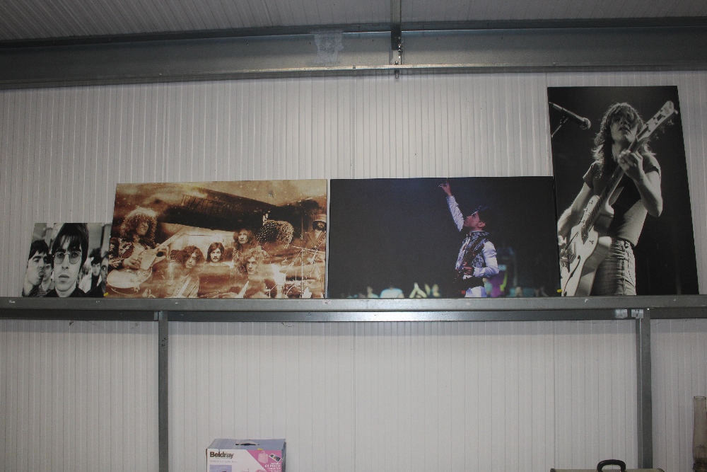Four canvas prints of Led Zeppelin; Prince; Malcolm Young AC/DC and Liam Gallagher