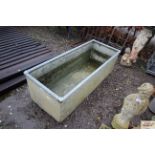 A galvanised water trough measuring approx. 20' x