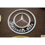 A painted cast iron sign for Mercedes-Benz (cm-48)