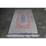 An approx. 6'10" x 4'2" Eastern pattern rug