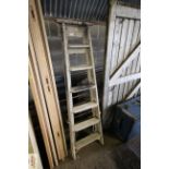 A seven step set of wooden folding steps
