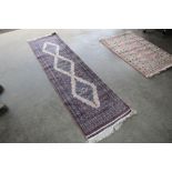 An approx. 7'11" x 2' Eastern pattern runner