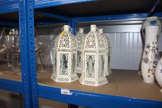 Two pairs of candle lanterns