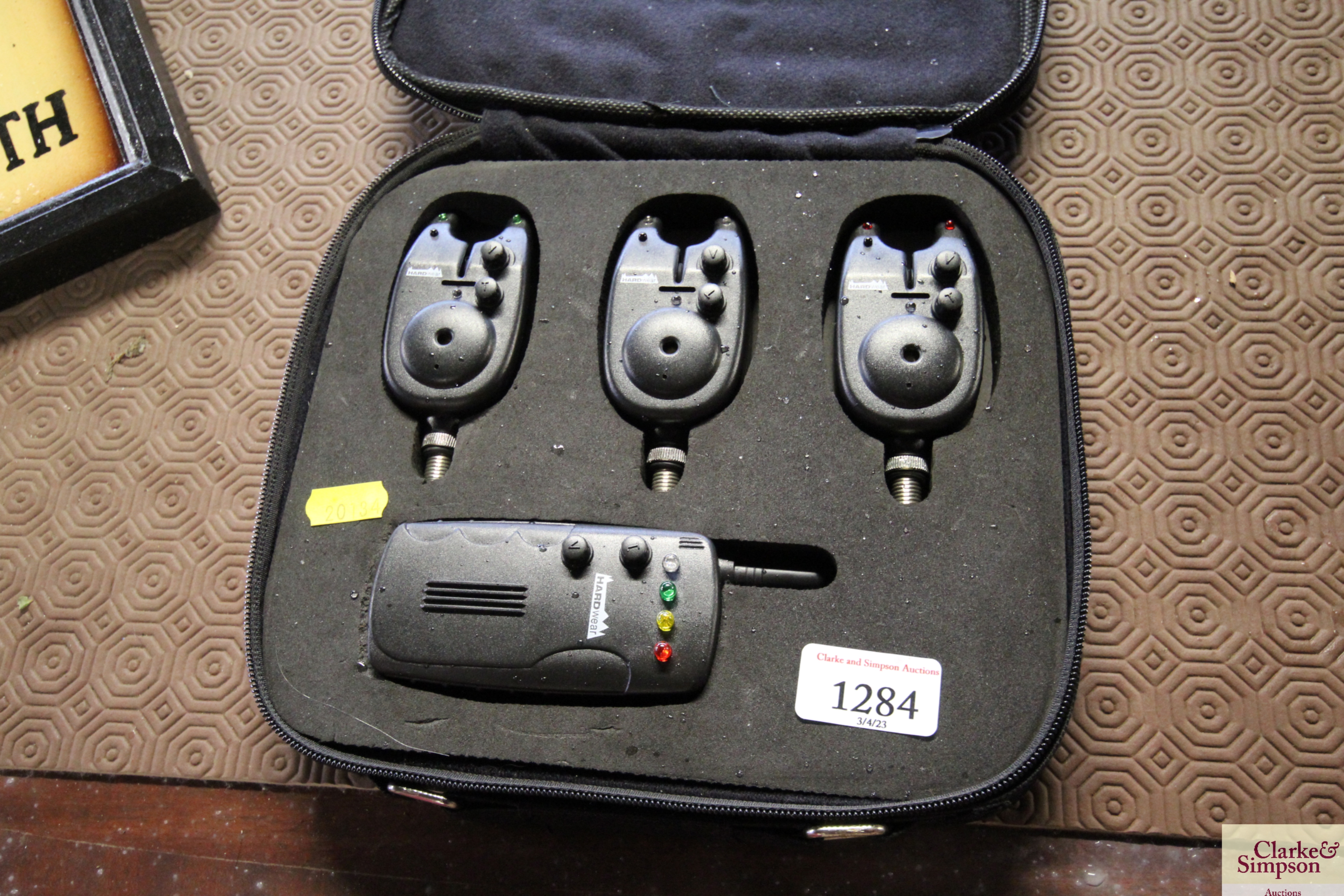 A cased set of Hardware fish line bite alarms and