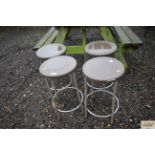 Four plastic and metal framed stools