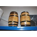 A pair of small coopered barrels