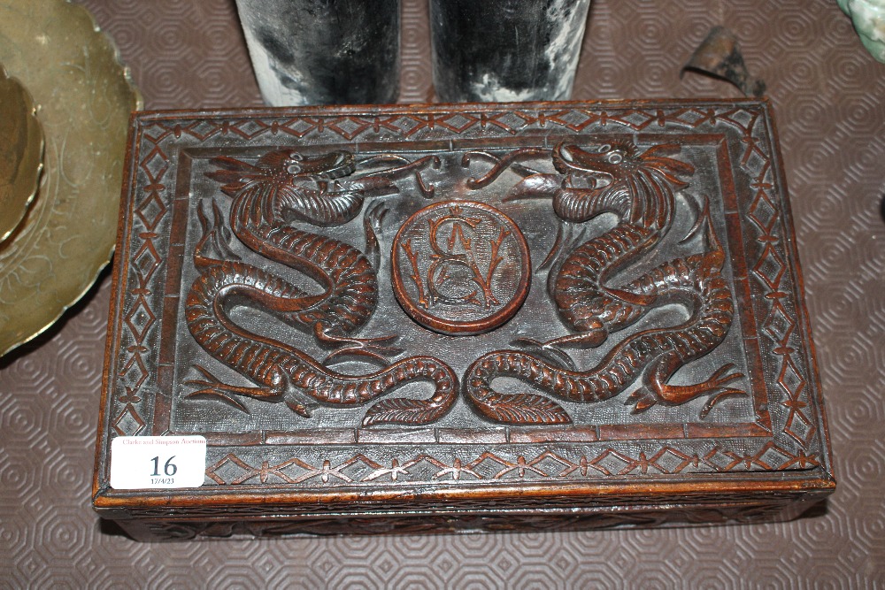 An Oriental carved wooden box decorated with drago - Image 2 of 3