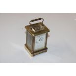 A Pierre Jacot brass cased carriage clock with key